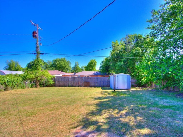 4704 Lisa Ln, Oklahoma City, OK 73115 - fenced backyard featuring a shed