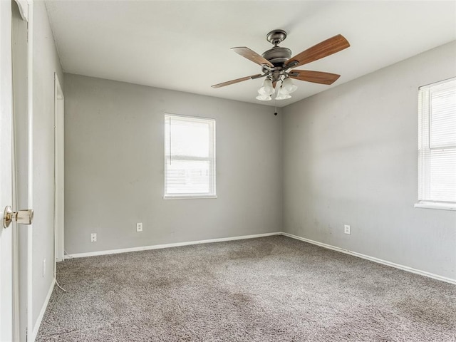 4704 Lisa Ln, Oklahoma City, OK 73115 - carpeted empty room featuring a ceiling fan and baseboards