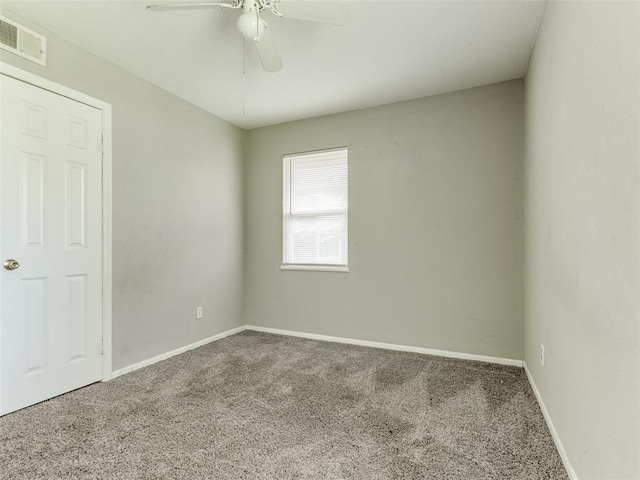 4704 Lisa Ln, Oklahoma City, OK 73115 - carpeted empty room featuring a ceiling fan and baseboards