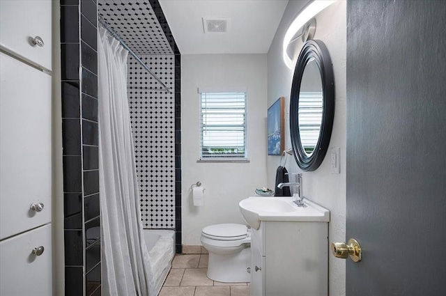 full bath with tile patterned floors, toilet, a shower with shower curtain, vanity, and baseboards