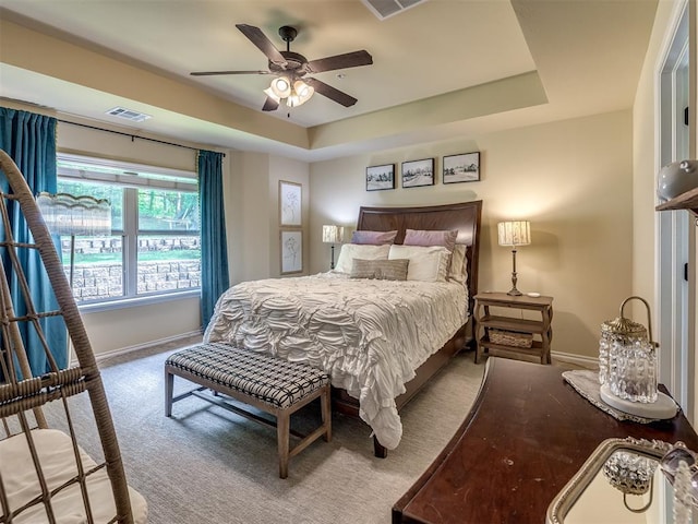 15101 SE 58th St, Choctaw, OK 73020 - bedroom with baseboards, a raised ceiling, and ceiling fan