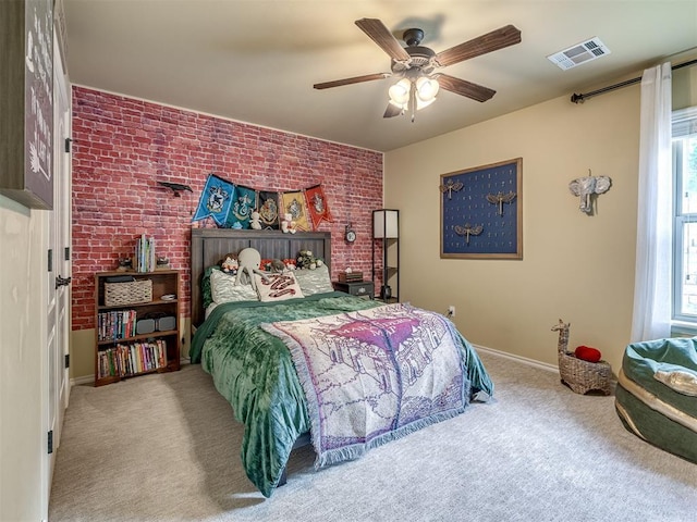 15101 SE 58th St, Choctaw, OK 73020 - bedroom featuring carpet floors, baseboards, brick wall, and a ceiling fan