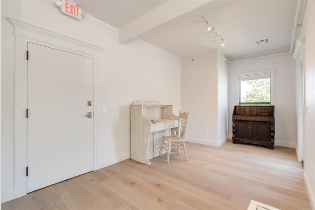 614 NW 8th St Unit 1-4, Oklahoma City, OK 73102 - entryway featuring light wood-style floors, rail lighting, and baseboards