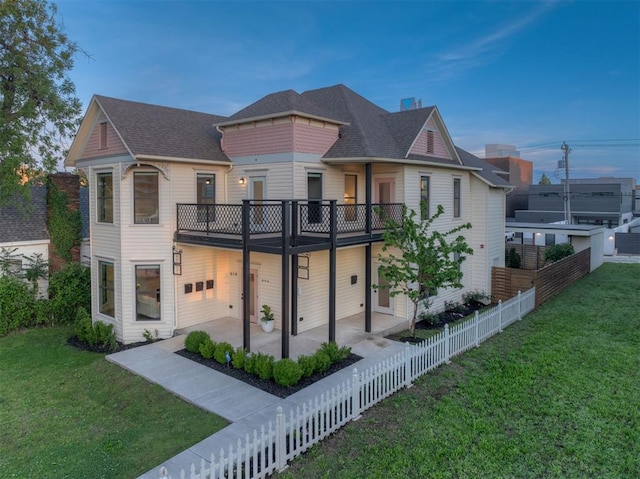 614 NW 8th St Unit 1-4, Oklahoma City, OK 73102 - view of front facade with a balcony, a patio area, and a shingled roof