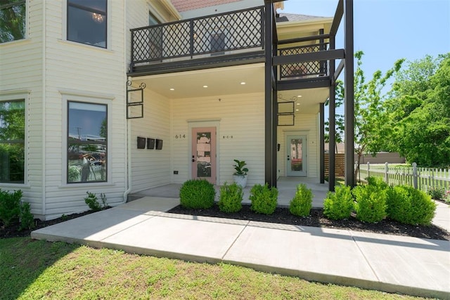 614 NW 8th St Unit 1-4, Oklahoma City, OK 73102 - view of front of house featuring a balcony and fence