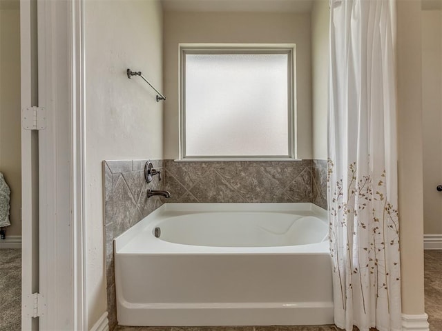 full bath featuring a garden tub