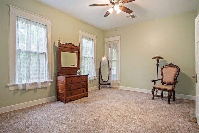 3715 N Mckinley Ave, Oklahoma City, OK 73118 - sitting room with ceiling fan, plenty of natural light, light carpet, and baseboards