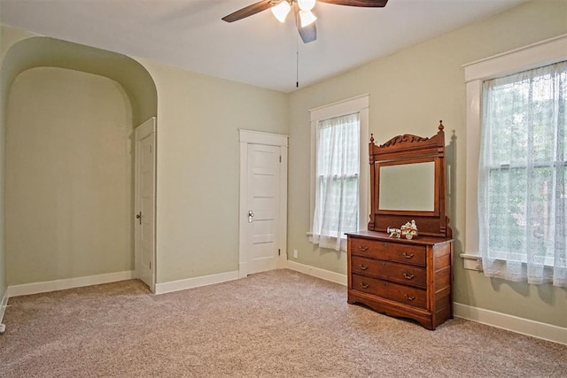 3715 N Mckinley Ave, Oklahoma City, OK 73118 - bedroom with light carpet, multiple windows, and baseboards