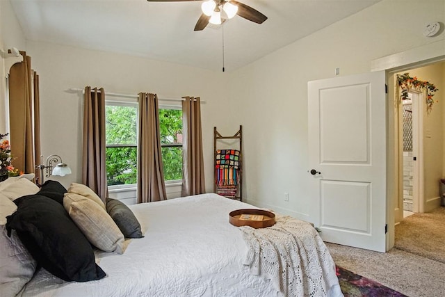 3715 N Mckinley Ave, Oklahoma City, OK 73118 - bedroom featuring carpet flooring, vaulted ceiling, a ceiling fan, and connected bathroom