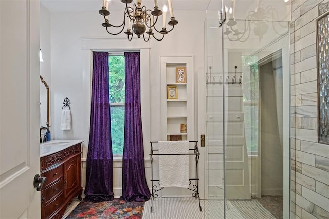 3715 N Mckinley Ave, Oklahoma City, OK 73118 - bathroom featuring a chandelier, a stall shower, vanity, and tile patterned flooring