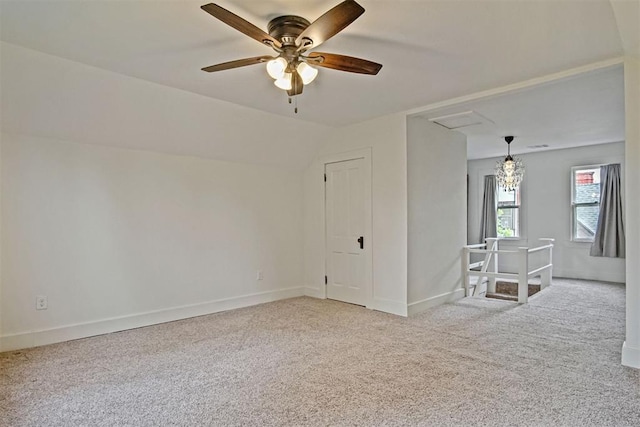 3715 N Mckinley Ave, Oklahoma City, OK 73118 - carpeted spare room with baseboards, ceiling fan, and lofted ceiling