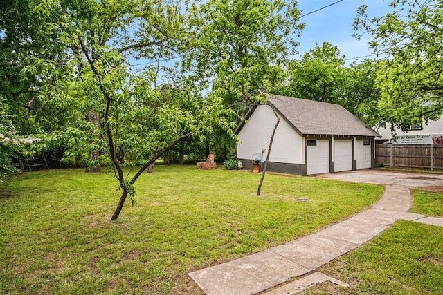 3715 N Mckinley Ave, Oklahoma City, OK 73118 - view of yard with an outdoor structure and a garage
