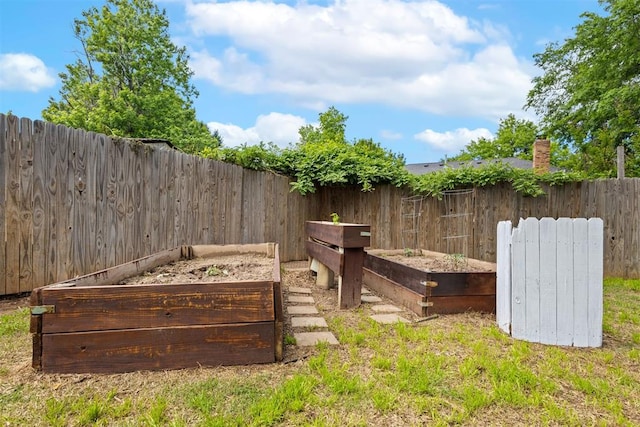 8309 NW 101st St, Oklahoma City, OK 73162 - fenced backyard with a garden