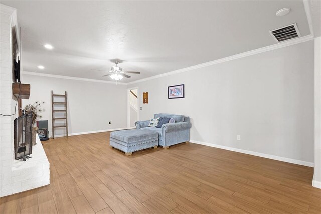 8309 NW 101st St, Oklahoma City, OK 73162 - sitting room with stairs, wood finished floors, baseboards, ornamental molding, and recessed lighting