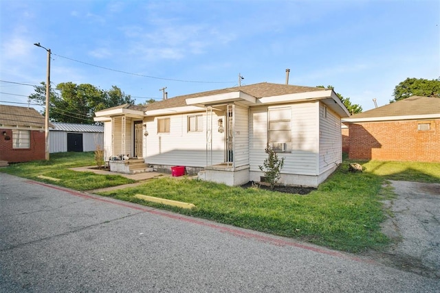 2819 SW 33rd St, Oklahoma City, OK 73119 - bungalow with a front yard and an outbuilding