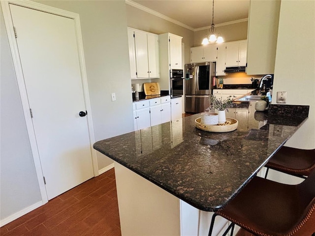 416 S Harrison Ave, Blanchard, OK 73010 - kitchen featuring wall oven, smart refrigerator, a peninsula, a sink, and dark wood finished floors