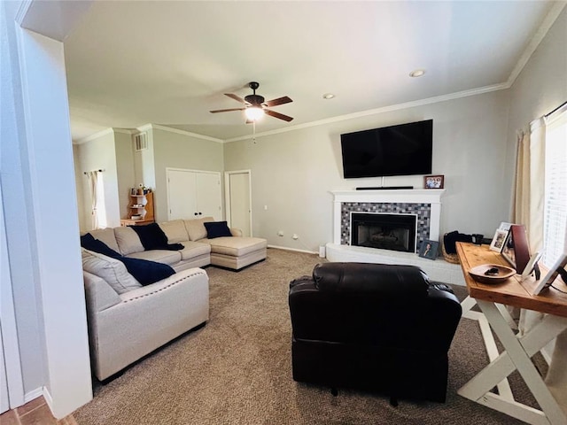 416 S Harrison Ave, Blanchard, OK 73010 - carpeted living room with ceiling fan, crown molding, a fireplace, and baseboards