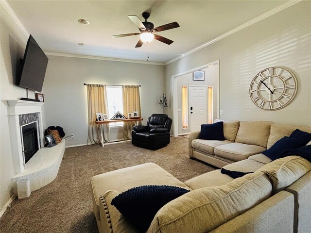 416 S Harrison Ave, Blanchard, OK 73010 - carpeted living area featuring a ceiling fan, a fireplace, ornamental molding, and baseboards