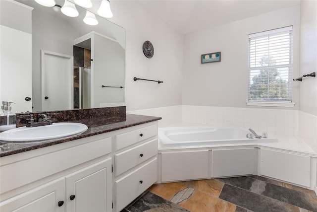 416 S Harrison Ave, Blanchard, OK 73010 - bathroom with a garden tub and vanity