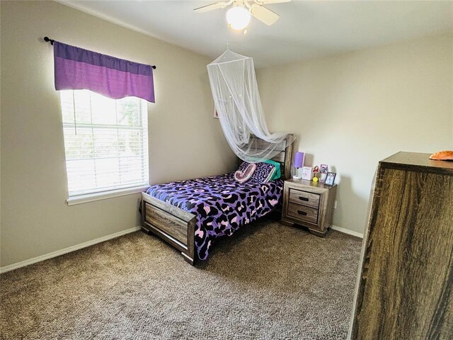 416 S Harrison Ave, Blanchard, OK 73010 - carpeted bedroom with baseboards and ceiling fan