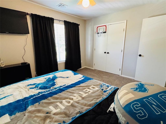 416 S Harrison Ave, Blanchard, OK 73010 - bedroom with carpet, a closet, and baseboards
