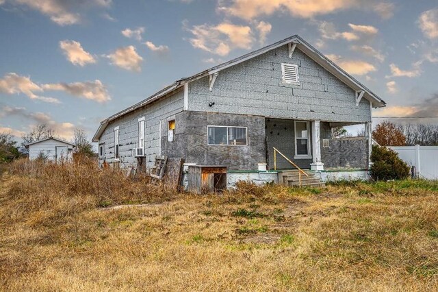 10015 S Bryant Rd, Henryetta, OK 74437 - rear view of property featuring fence