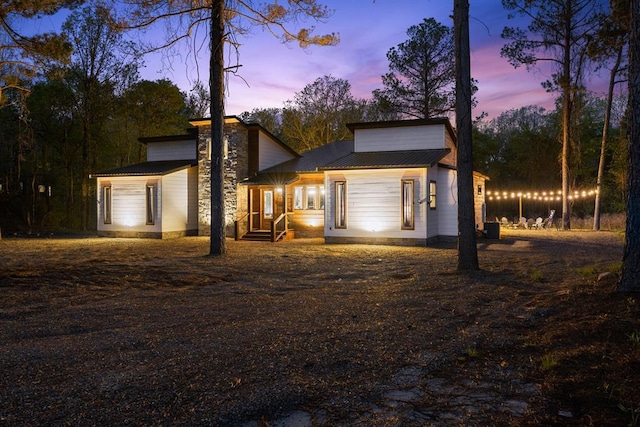 view of front of home featuring metal roof