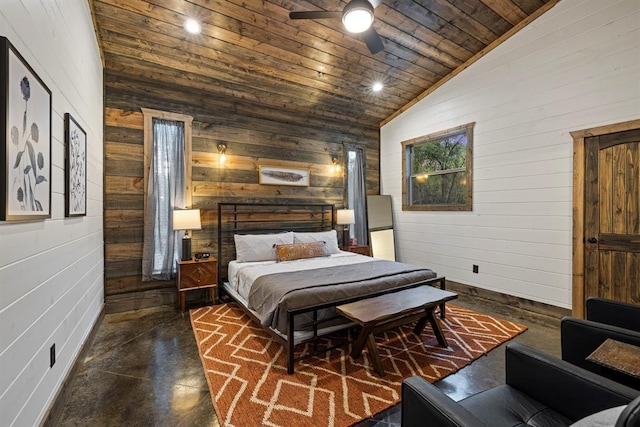 bedroom with lofted ceiling, wooden walls, wooden ceiling, finished concrete flooring, and ceiling fan