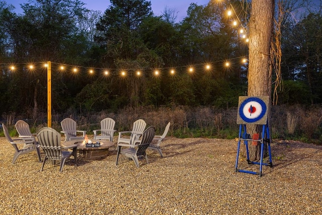 view of yard featuring a fire pit