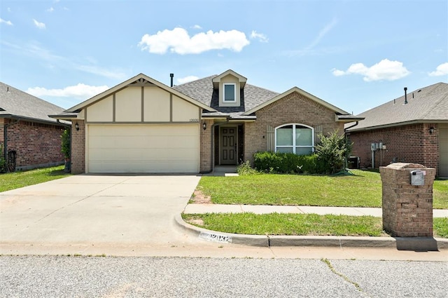 12032 SW 10th St, Yukon, OK 73099 - view of front facade featuring brick siding, concrete driveway, a front lawn, a garage, and a shingled roof