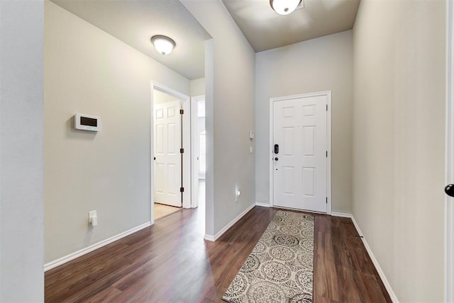 12032 SW 10th St, Yukon, OK 73099 - entryway with dark wood-style floors and baseboards
