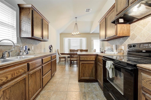 12032 SW 10th St, Yukon, OK 73099 - kitchen featuring black electric range oven, under cabinet range hood, decorative backsplash, a chandelier, and lofted ceiling