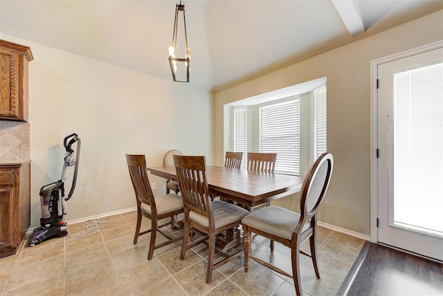 12032 SW 10th St, Yukon, OK 73099 - dining area with healthy amount of natural light and vaulted ceiling