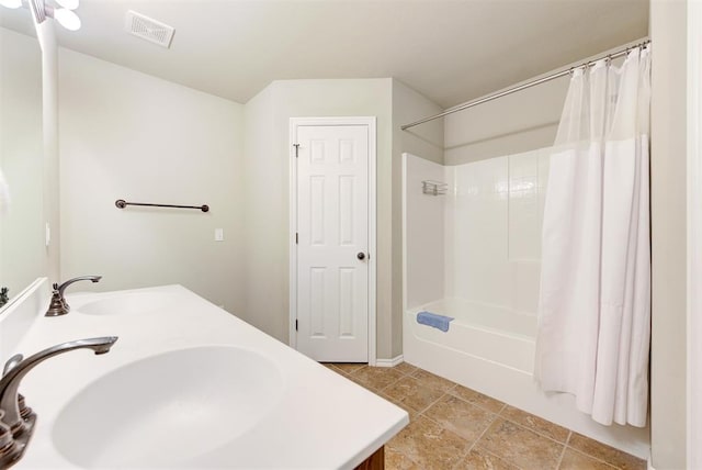 12032 SW 10th St, Yukon, OK 73099 - full bath with double vanity and shower / bathtub combination with curtain