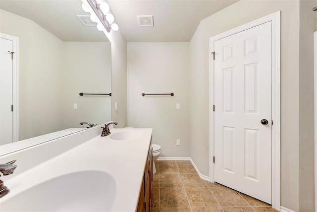 12032 SW 10th St, Yukon, OK 73099 - full bath featuring toilet and double vanity