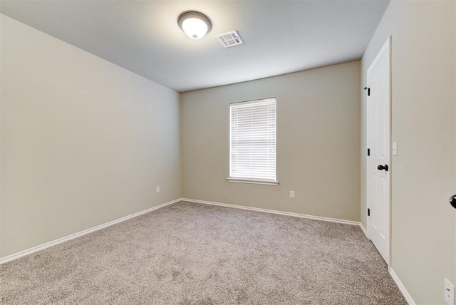 12032 SW 10th St, Yukon, OK 73099 - carpeted spare room with baseboards