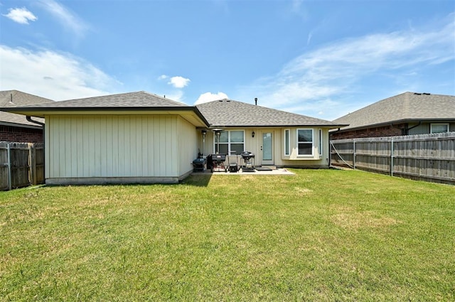 12032 SW 10th St, Yukon, OK 73099 - back of house with a fenced backyard and a patio area