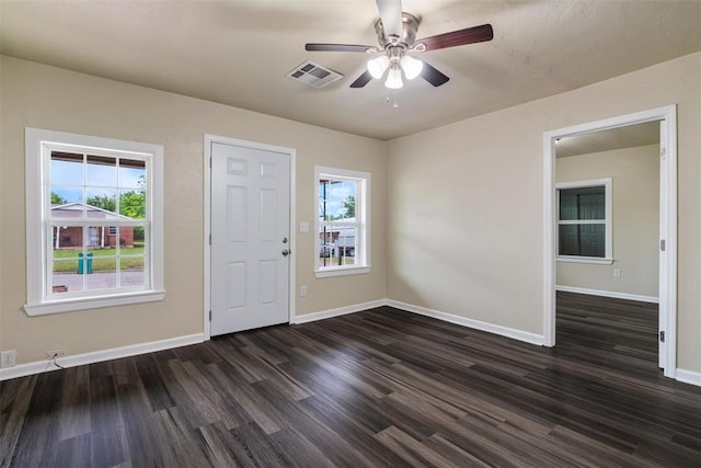 436 SE 54th St, Oklahoma City, OK 73129 - entryway with plenty of natural light, dark wood-style flooring, baseboards, and ceiling fan