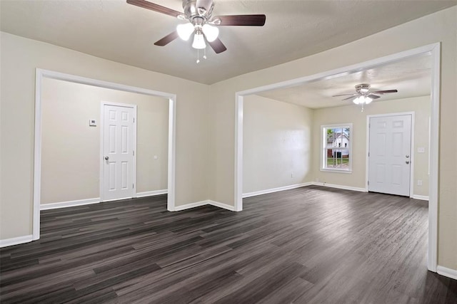 436 SE 54th St, Oklahoma City, OK 73129 - unfurnished room with dark wood-style floors, ceiling fan, and baseboards