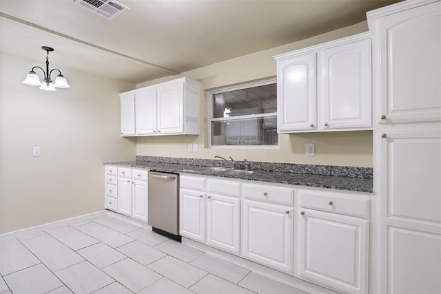 436 SE 54th St, Oklahoma City, OK 73129 - kitchen featuring a sink, stainless steel dishwasher, a chandelier, white cabinetry, and hanging light fixtures