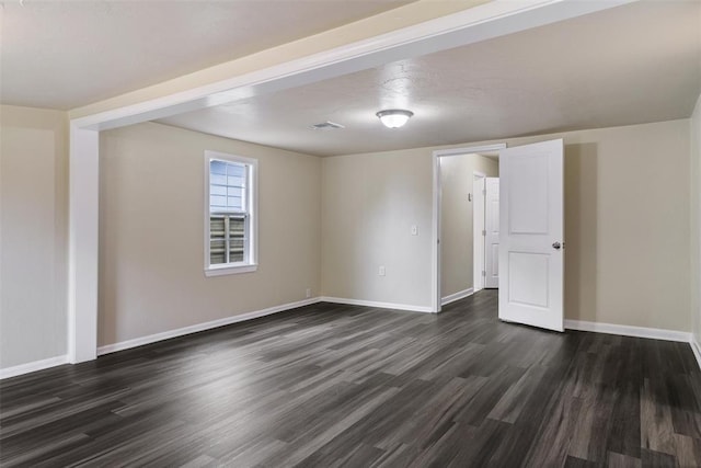 436 SE 54th St, Oklahoma City, OK 73129 - unfurnished room featuring dark wood-style floors and baseboards