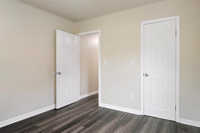 436 SE 54th St, Oklahoma City, OK 73129 - unfurnished bedroom with dark wood-type flooring, ornamental molding, and baseboards