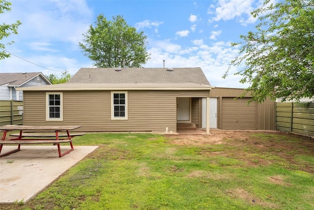 436 SE 54th St, Oklahoma City, OK 73129 - rear view of property with entry steps and an attached garage