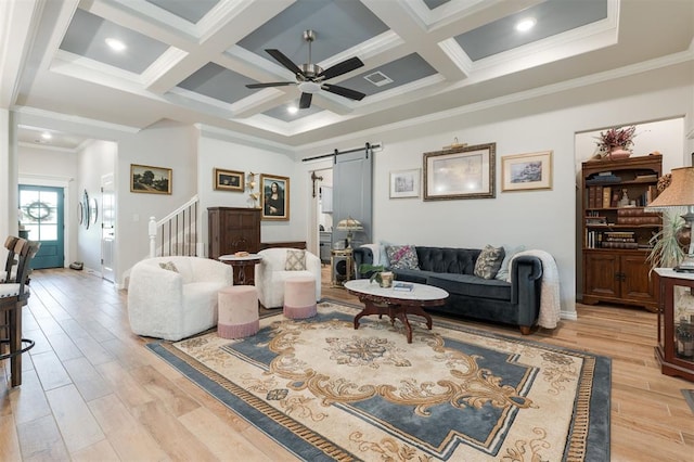 8208 Poplar Dr, Edmond, OK 73034 - living area with a barn door, light wood-type flooring, crown molding, a ceiling fan, and beamed ceiling