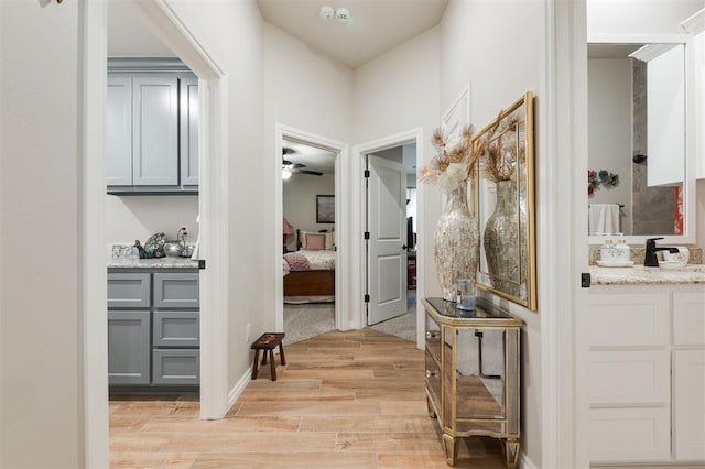 8208 Poplar Dr, Edmond, OK 73034 - hall with light wood-style flooring