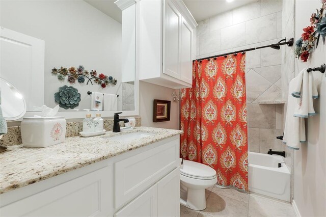 8208 Poplar Dr, Edmond, OK 73034 - bathroom featuring vanity, toilet, shower / bath combo, and tile patterned flooring