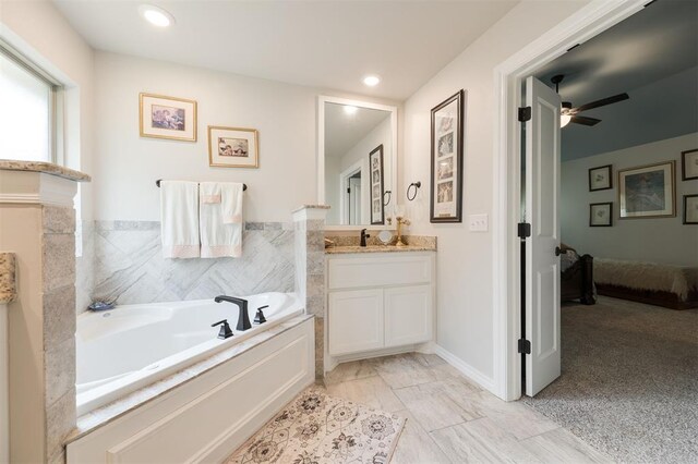 8208 Poplar Dr, Edmond, OK 73034 - ensuite bathroom featuring vanity, a bath, ceiling fan, and recessed lighting