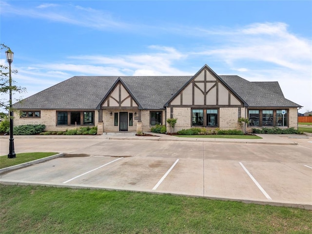8208 Poplar Dr, Edmond, OK 73034 - view of property featuring uncovered parking