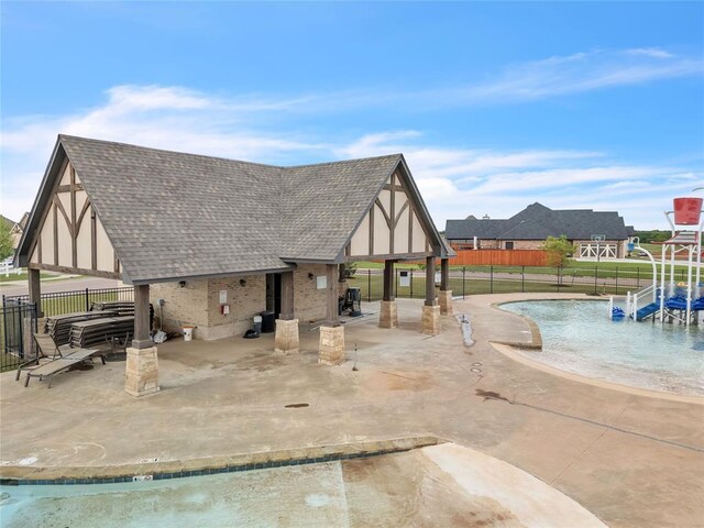 8208 Poplar Dr, Edmond, OK 73034 - view of swimming pool featuring a patio
