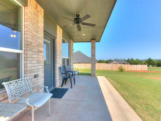 6965 Seabiscuit Ln, Guthrie, OK 73044 - view of patio featuring a ceiling fan